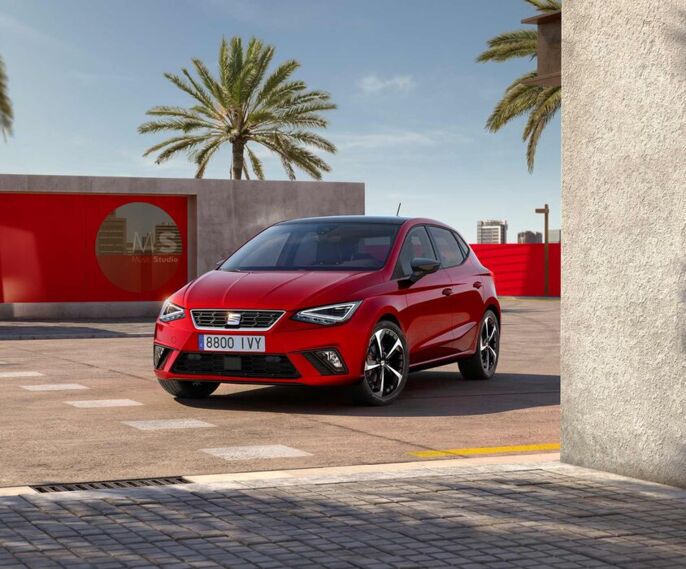 seat-ibiza-desire-red-colour-with-alloy-wheels
